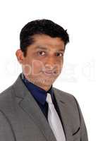 A close up image of a east Indian businessman
