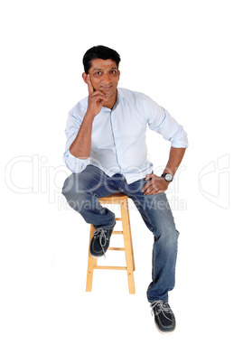 Full length image of Asian man sitting