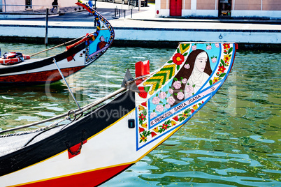 Painted boats on the canal of Aveiro