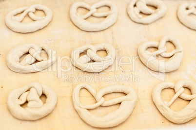 Uncooked pretzel ready to be baked
