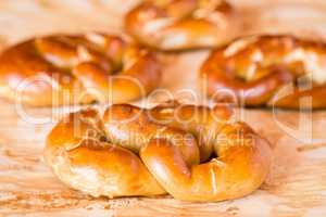 Cooked pretzel over the greaseproof paper