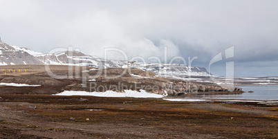 Mountain landscape and satellite dish in Ny Alesund, Svalbard is