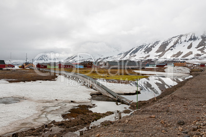 Mountains and wooden houses in Ny Alesund, Svalbard islands