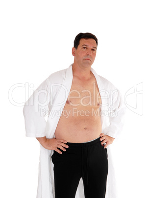 Man standing in bathrobe shirtless