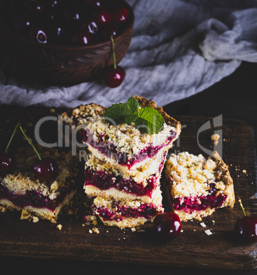 pile of baked cake with cherry