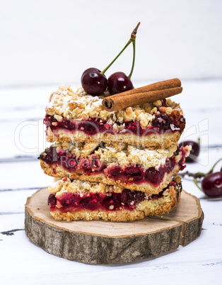 pile of baked cake with cherry