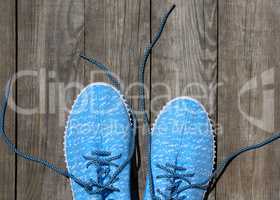 a pair of blue textile shoes