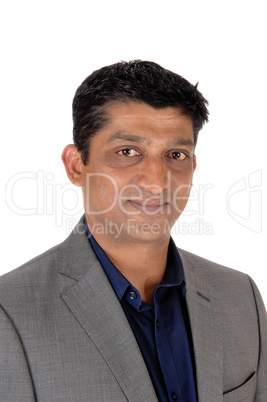 A close up image of a east Indian businessman