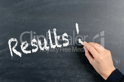 Results, writing on a blackboard