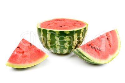 Ripe round watermelon and half a berry isolated on white .