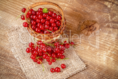Redcurrant on wooden table