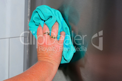 Housework wipe off dust and dirt with blue rags.