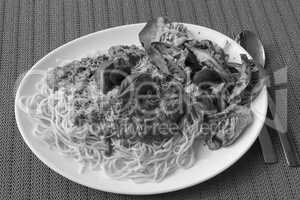 Spaghetti Bolognese with basil leaf