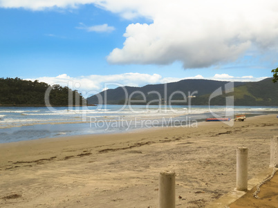 View of the beach with island in the background.