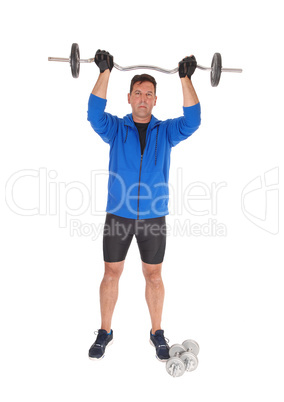 Tall man lifting the weight over his head