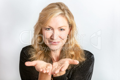 Studio Portrait of Healthy Happy Middle Aged Woman Hands Out