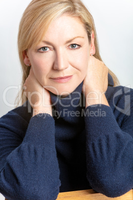 Studio Portrait of Healthy Happy Middle Aged Woman