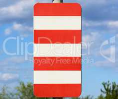 road sign with a red stripe on a white background