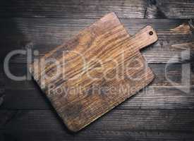 empty very old brown wooden kitchen cutting board