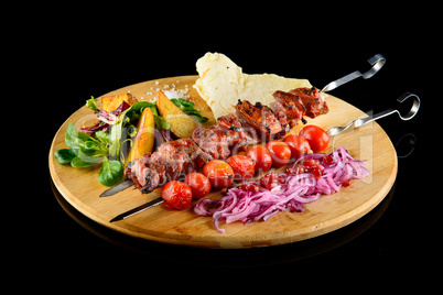 oriental kebab on black background