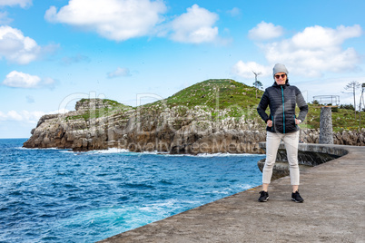 Woman enjoys the lively Atlantic Ocean