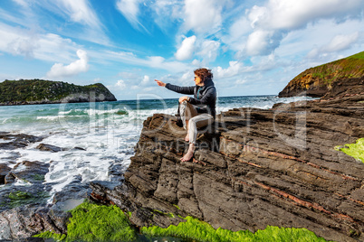 Woman enjoys the lively Atlantic Ocean
