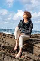 Woman enjoys the lively Atlantic Ocean