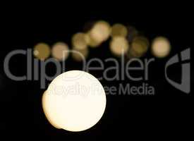 Soft bokeh background.  Garland of electric lights. Place to add