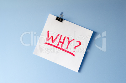 The word Why on white paper sheet asking for help in solving a m
