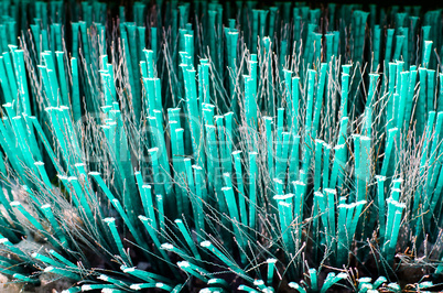 Close-up of cleaning brush of sweeping machine background