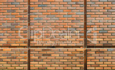 Red and orange brick wall with cement clay background