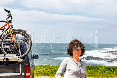 With camping bus on the Atlantic coast in Spain