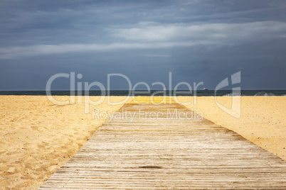 Wooden pier to the sea