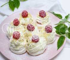 cakes made of egg white and whipped white cream with raspberrie