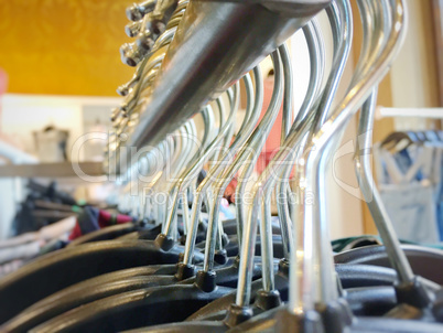 Many hangers on a clothes rack