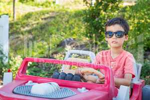 Young Mixed Race Chinese and Caucasian Boy Wearing Sunglasses Pl
