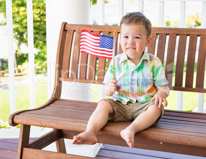 Young Mixed Race Chinese and Caucasian Boy Playing With American