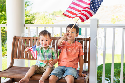 Young Mixed Race Chinese and Caucasian Brothers Playing With Ame