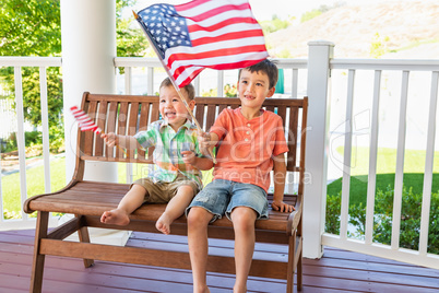 Young Mixed Race Chinese and Caucasian Brothers Playing With Ame