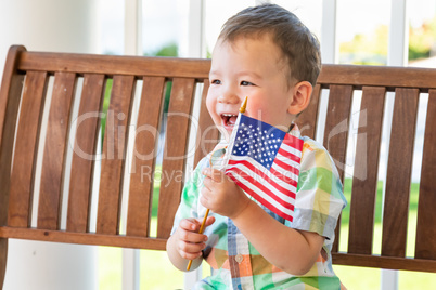 Young Mixed Race Chinese and Caucasian Boy Playing With American