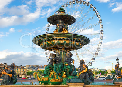 Fountain and ferris wheel in Paris