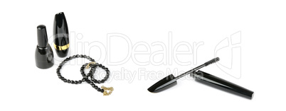 Cosmetics and beads isolated on white background. Wide photo.