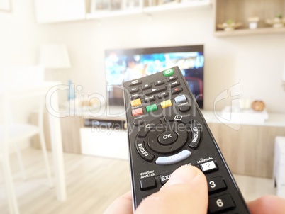 Hand hold the television remote control