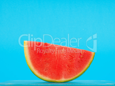 Slice of watermelon on blue