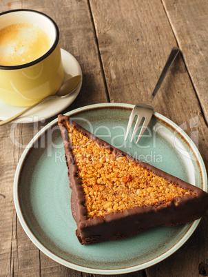 Tasty organic cookie with cup of coffee