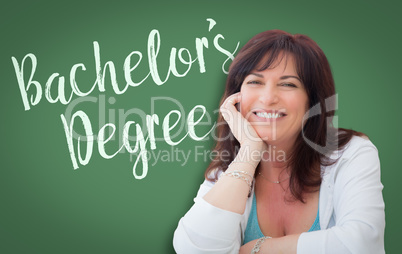Bachelor's Degree Written On Green Chalkboard Behind Smiling Mid