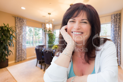 Attractive Middle Aged Woman Portrait Inside LIving Room At Home