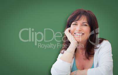 Attractive Middle Aged Woman Portrait In Front of Green Chalkboa