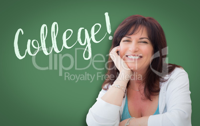 College Written On Green Chalkboard Behind Smiling Middle Aged W
