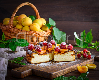 curd pie with raspberries and apricots